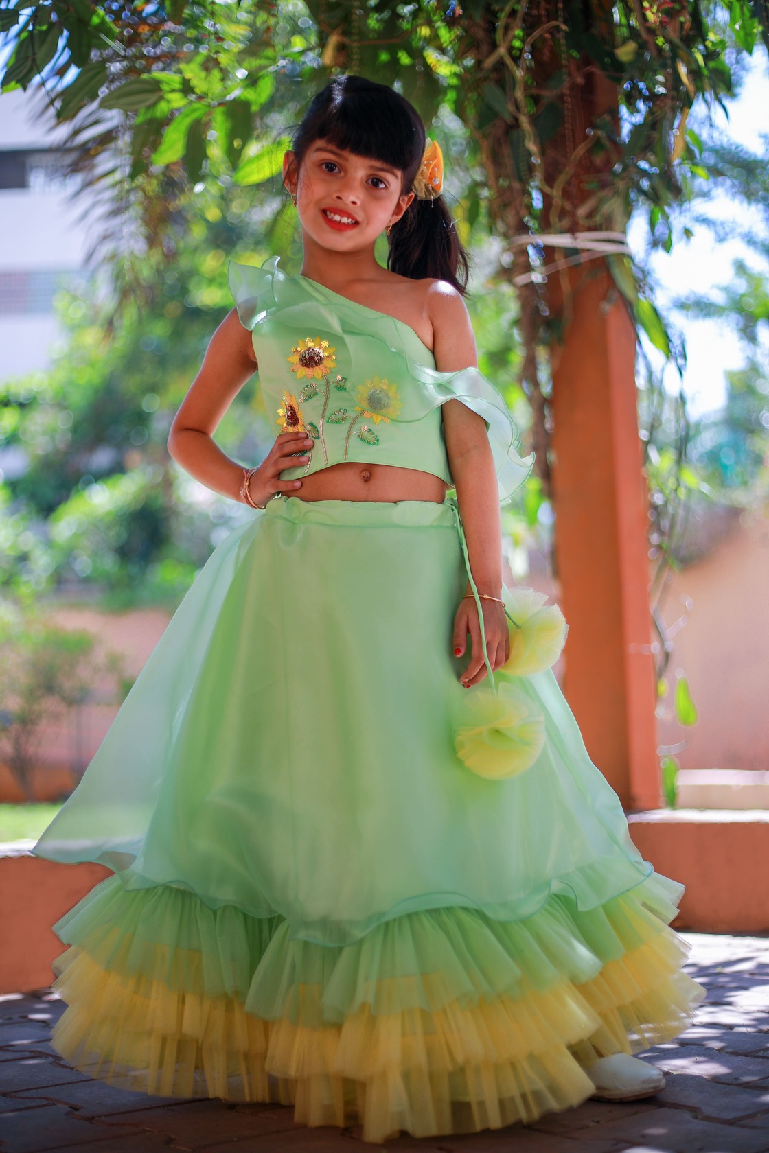 1M7A9653 Sunflower one shouldered Green Top with tiered Lehenga