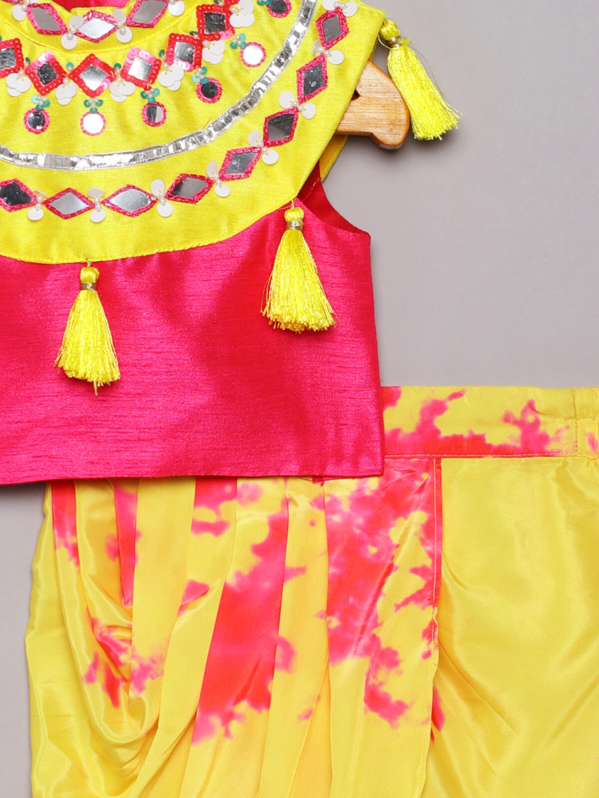 5 8 Yellow top with tassels paired with tie die dhoti pant