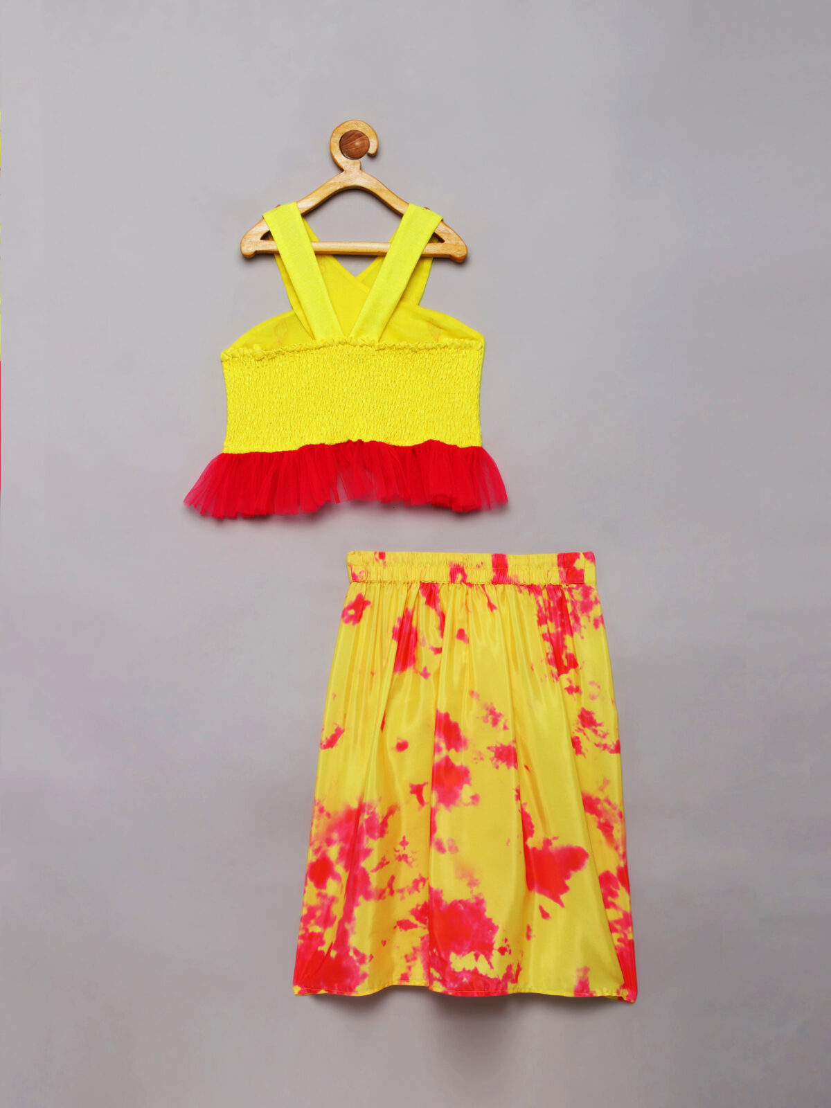 2 Yellow, Pink Tie Dye Criss Cross top and Saree draped skirt